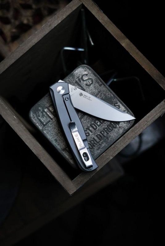 Ніж складаний кишеньковий Ruike M661-TZ, (7.4 см) steel 154СМ / G10 чорний