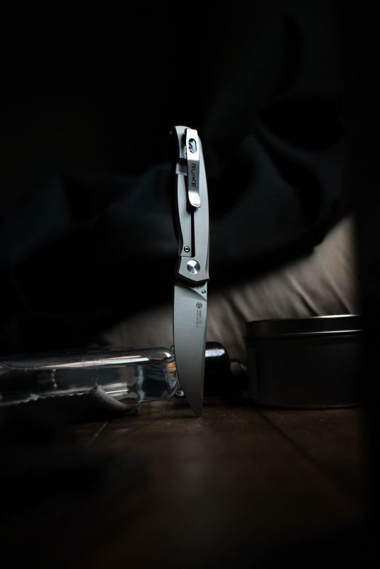 Ніж складаний кишеньковий Ruike M661-TZ, (7.4 см) steel 154СМ / G10 чорний