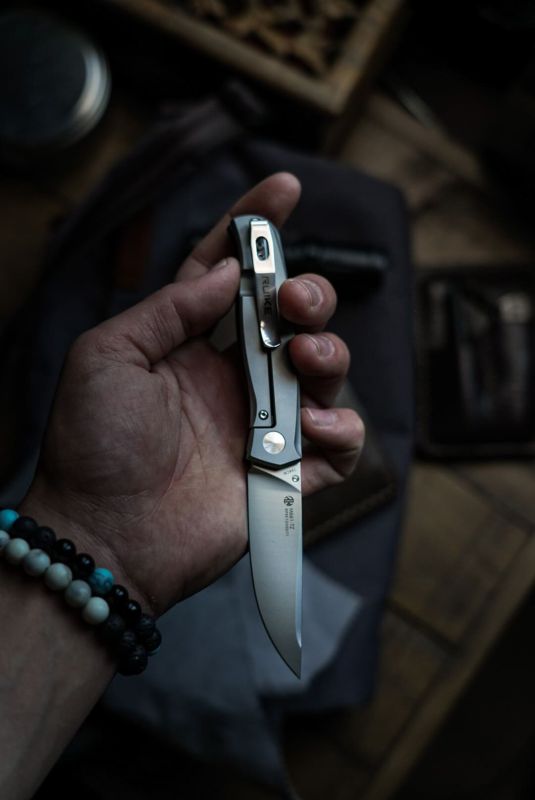 Ніж складаний кишеньковий Ruike M661-TZ, (7.4 см) steel 154СМ / G10 чорний